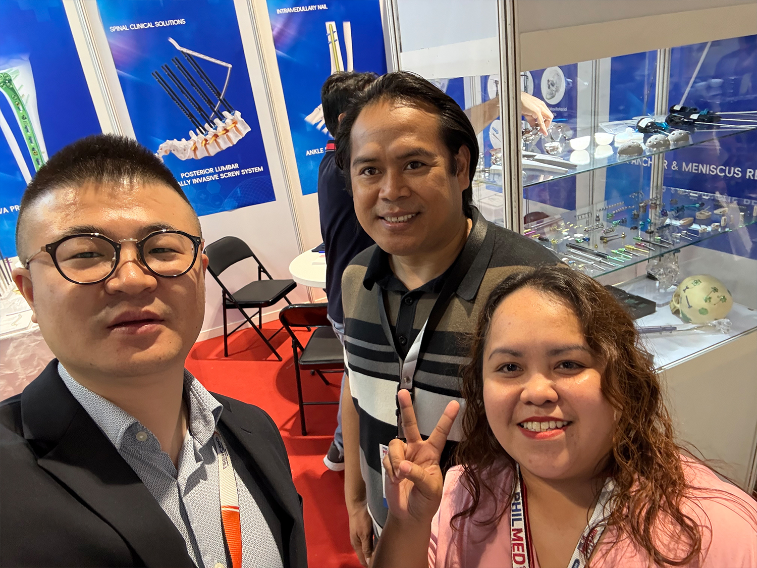 CZMEDITECH team and visitors at Booth 35 in Manila
