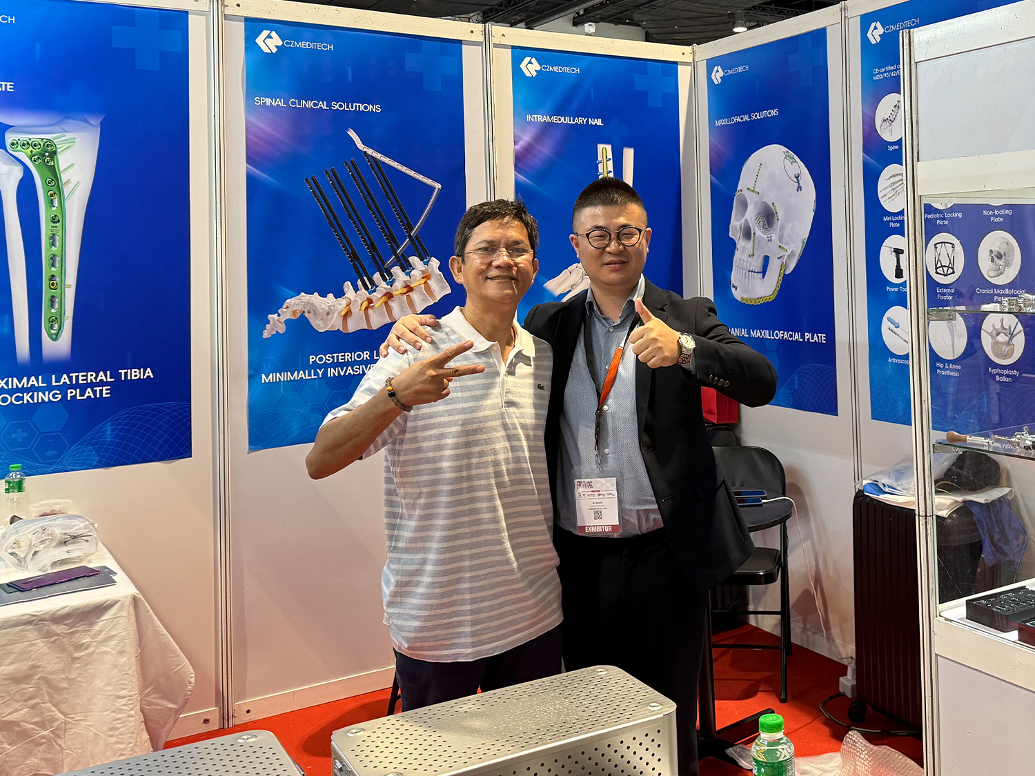 CZMEDITECH representative with an industry partner at the exhibition