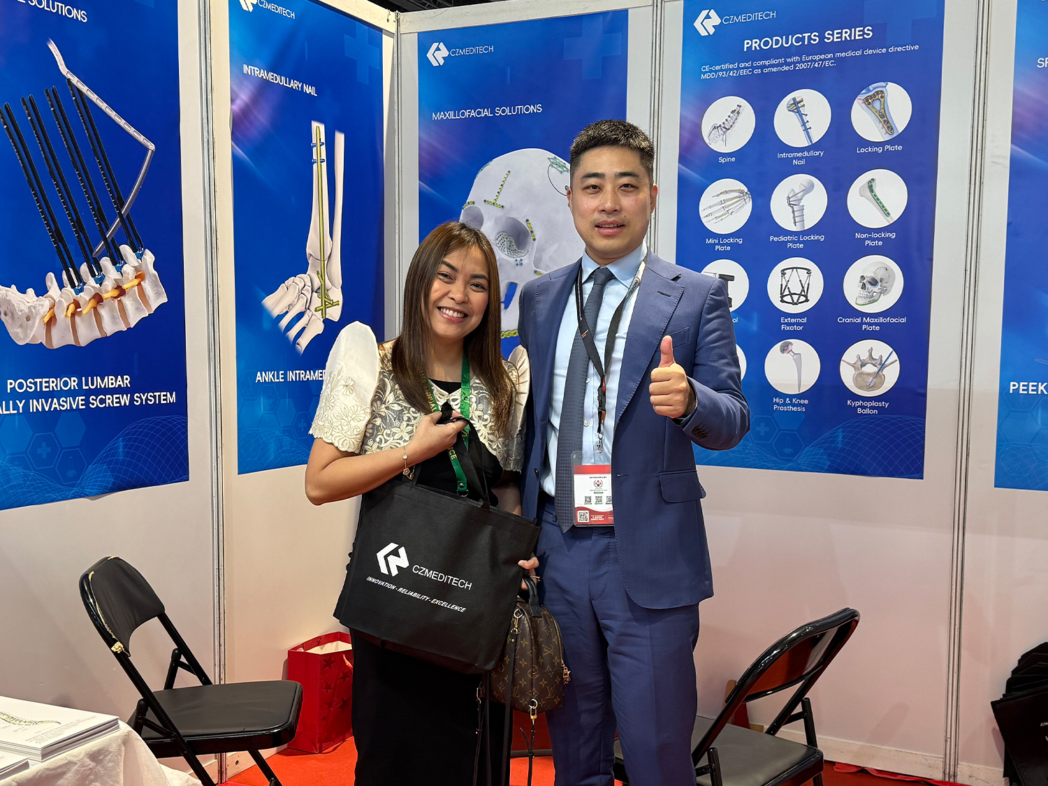 CZMEDITECH representative welcoming a visitor at Medical Philippines Expo 2026